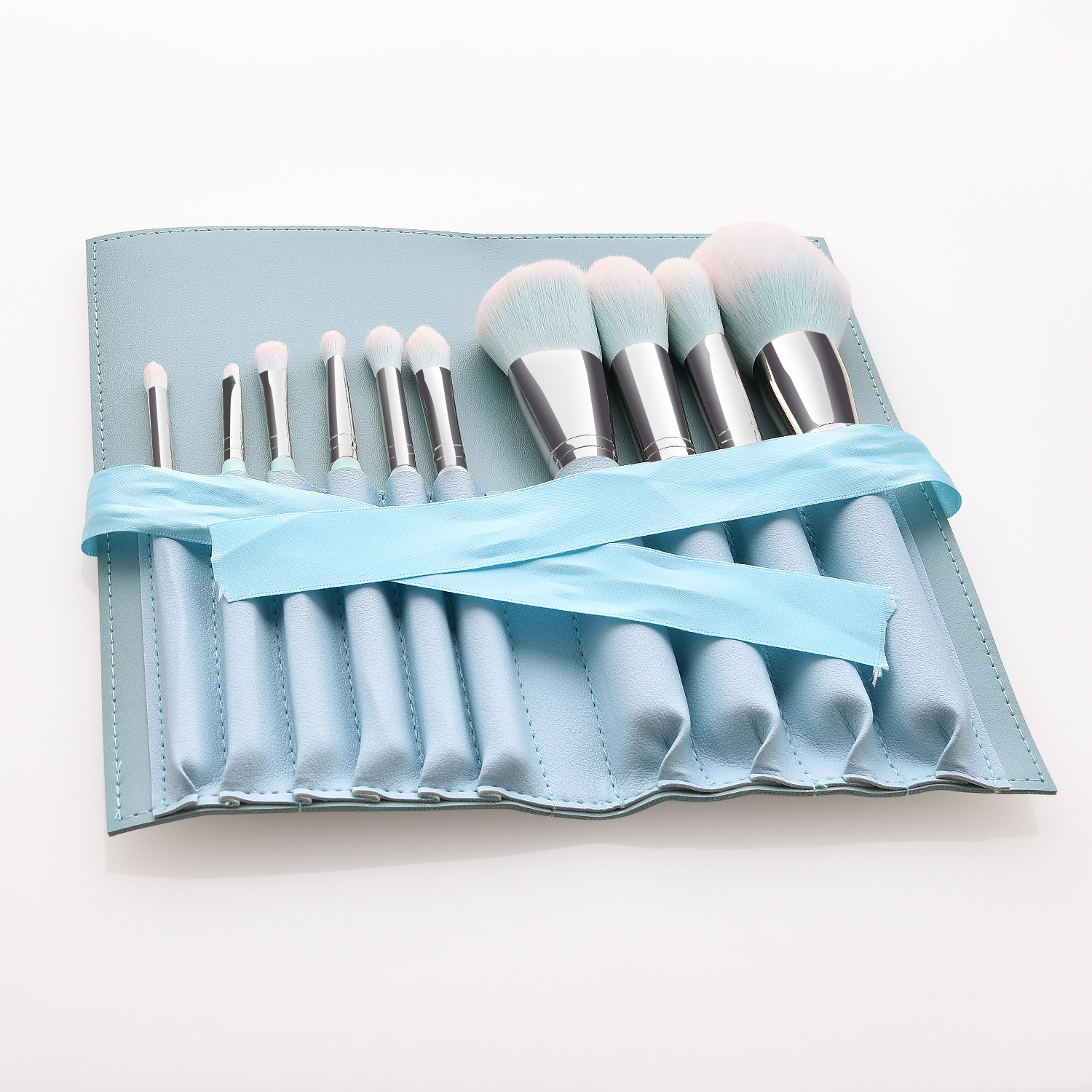 light blue bag with brushes