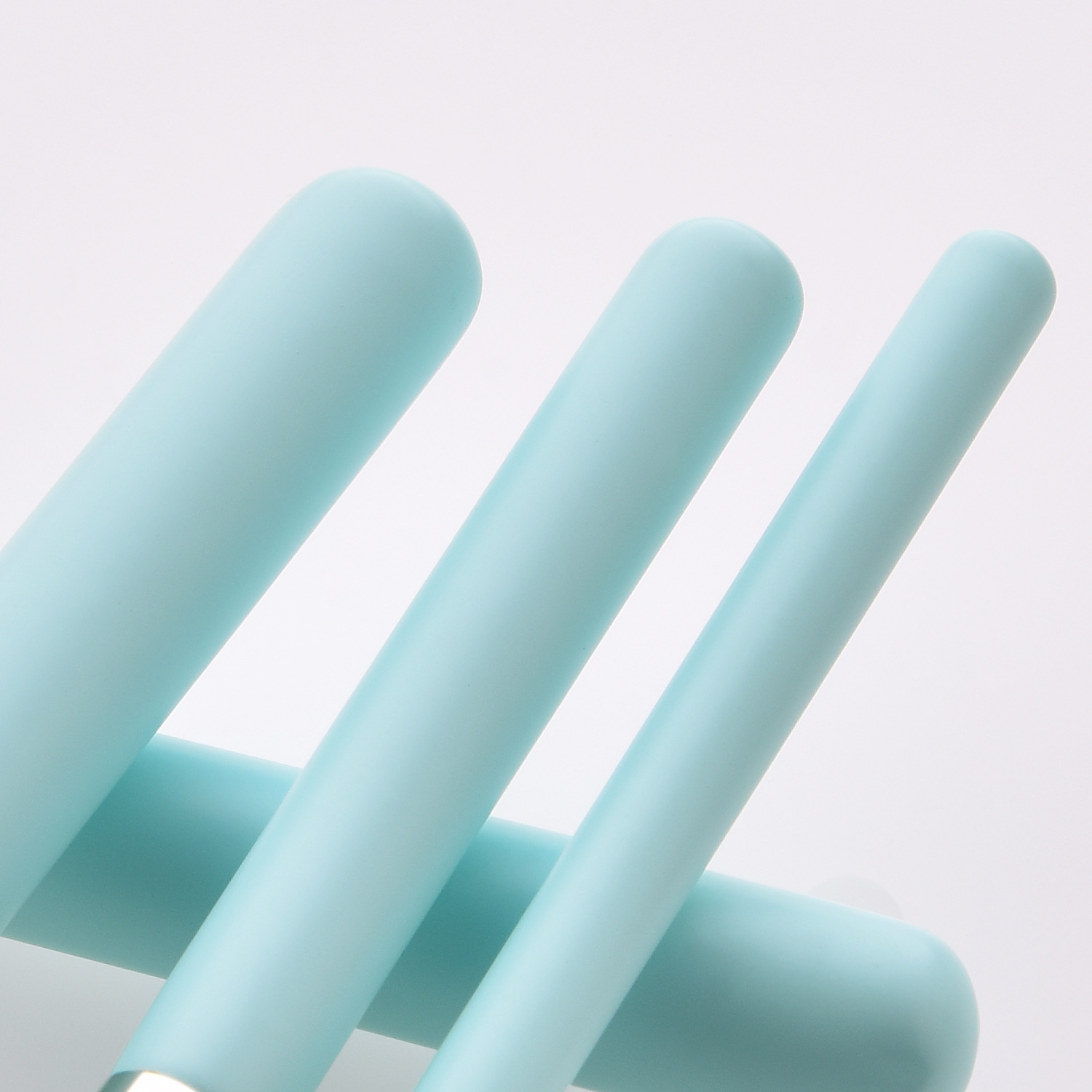 light blue handle makeup brush