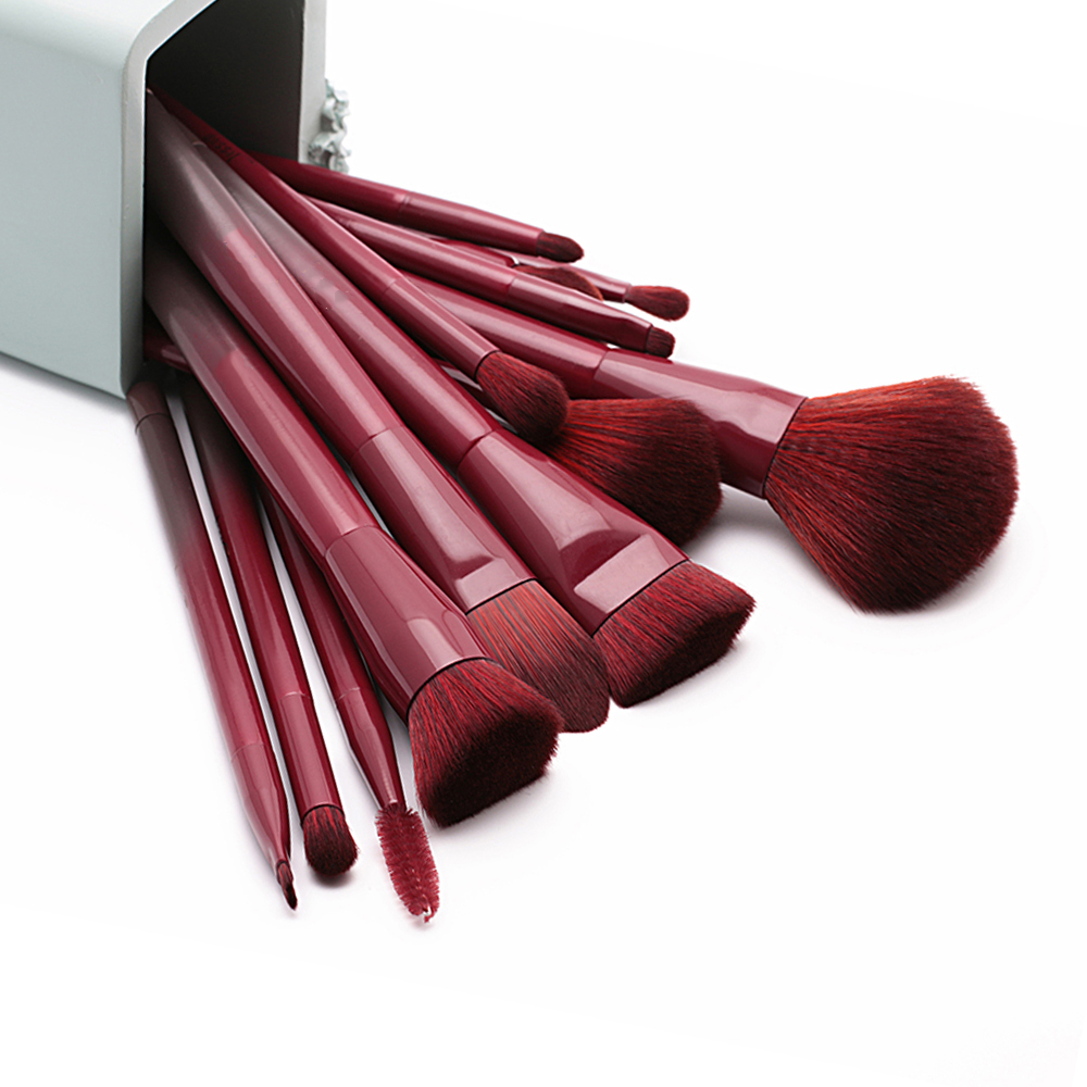 red makeup brush